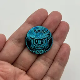 In hand, from Pokémon Coin Fan, full size