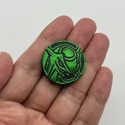 In hand, from Pokémon Coin Fan, full size