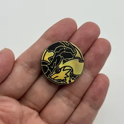 In hand, from Pokémon Coin Fan, full size