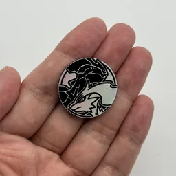 In hand, from Pokémon Coin Fan, full size