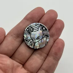 In hand, from Pokémon Coin Fan, full size