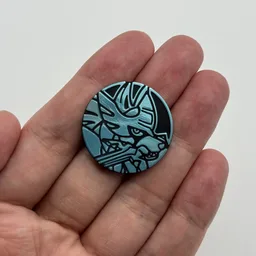In hand, from Pokémon Coin Fan, full size