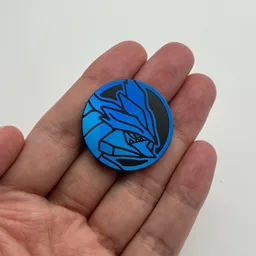 In hand, from Pokémon Coin Fan, full size