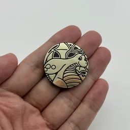 In hand, from Pokémon Coin Fan, full size