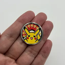 In hand, from Pokémon Coin Fan, full size