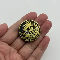 In hand, from Pokémon Coin Fan, full size