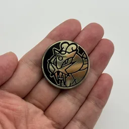 In hand, from Pokémon Coin Fan, full size