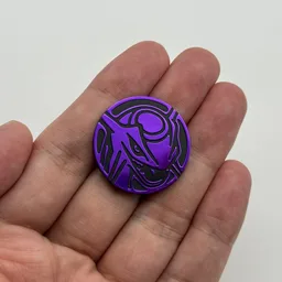 In hand, from Pokémon Coin Fan, full size