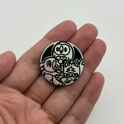 In hand, from Pokémon Coin Fan, full size