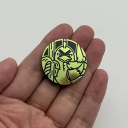 In hand, from Pokémon Coin Fan, full size