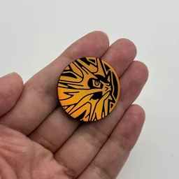 In hand, from Pokémon Coin Fan, full size