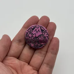 In hand, from Pokémon Coin Fan, full size