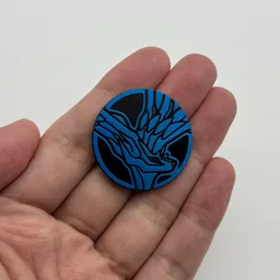 In hand, from Pokémon Coin Fan, full size