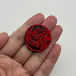In hand, from Pokémon Coin Fan, full size