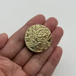 In hand, from Pokémon Coin Fan, full size