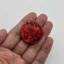 In hand, from Pokémon Coin Fan, full size