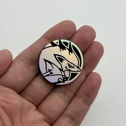 In hand, from Pokémon Coin Fan, full size