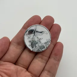 In hand, from Pokémon Coin Fan, full size