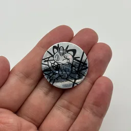 In hand, from Pokémon Coin Fan, full size