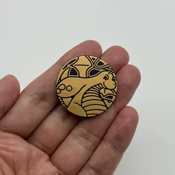 In hand, from Pokémon Coin Fan, full size