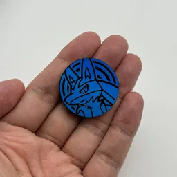 In hand, from Pokémon Coin Fan, full size