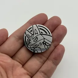 In hand, from Pokémon Coin Fan, full size