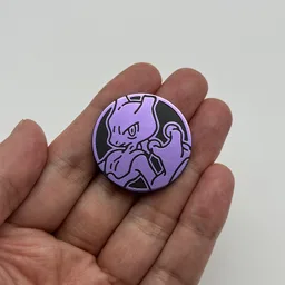 In hand, from Pokémon Coin Fan, full size