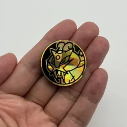 In hand, from Pokémon Coin Fan, full size