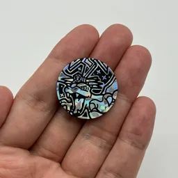 In hand, from Pokémon Coin Fan, full size