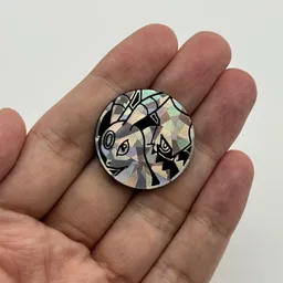 In hand, from Pokémon Coin Fan, full size