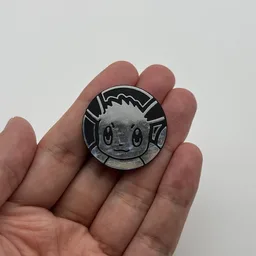 In hand, from Pokémon Coin Fan, full size