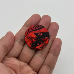 In hand, from Pokémon Coin Fan, full size
