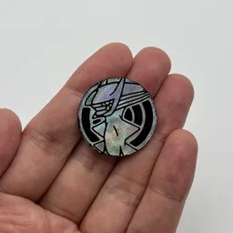 In hand, from Pokémon Coin Fan, full size