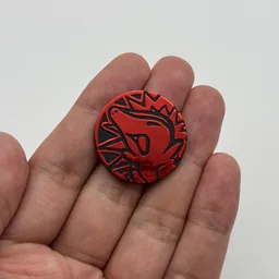 In hand, from Pokémon Coin Fan, full size