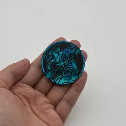 In hand, from Pokémon Coin Fan, full size