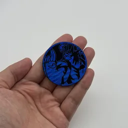 In hand, from Pokémon Coin Fan, full size