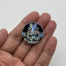 In hand, from Pokémon Coin Fan, full size