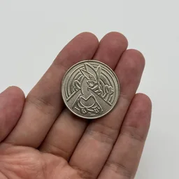 In hand, from Pokémon Coin Fan, full size