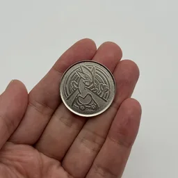 In hand, from Pokémon Coin Fan, full size