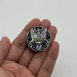 In hand, from Pokémon Coin Fan, full size