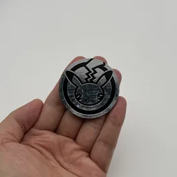 In hand, from Pokémon Coin Fan, full size