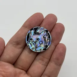 In hand, from Pokémon Coin Fan, full size