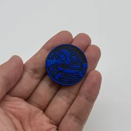 In hand, from Pokémon Coin Fan, full size