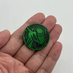 In hand, from Pokémon Coin Fan, full size