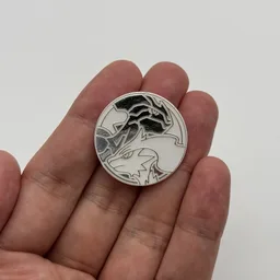 In hand, from Pokémon Coin Fan, full size