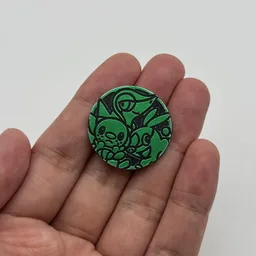 In hand, from Pokémon Coin Fan, full size