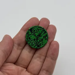 In hand, from Pokémon Coin Fan, full size