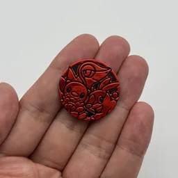 In hand, from Pokémon Coin Fan, full size