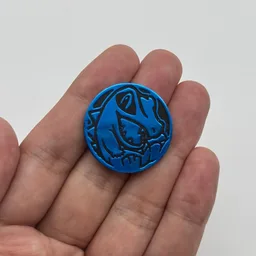 In hand, from Pokémon Coin Fan, full size