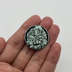 In hand, from Pokémon Coin Fan, full size
